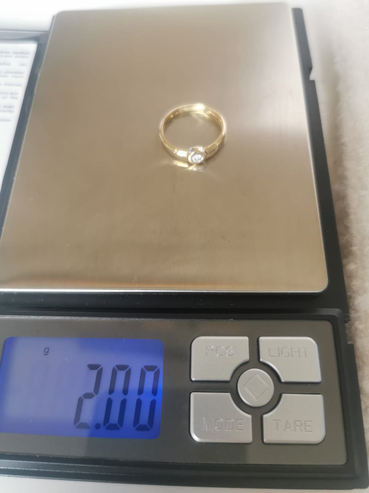 14k gold ring with natural diamond